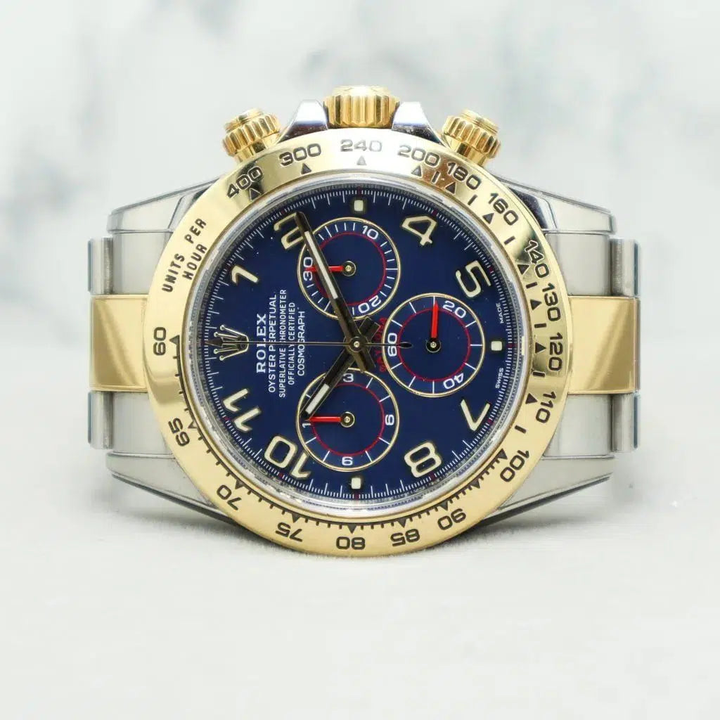 Rolex Daytona featuring a two-tone stainless steel and yellow gold finish with a distinctive blue dial