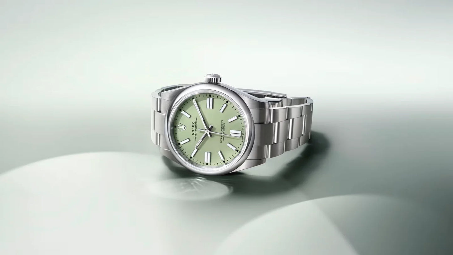 Rolex Oyster Perpetual watch with a pistachio green dial