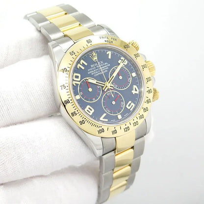 Rolex  Daytona featuring a two-tone stainless steel and yellow gold finish with a distinctive blue dial