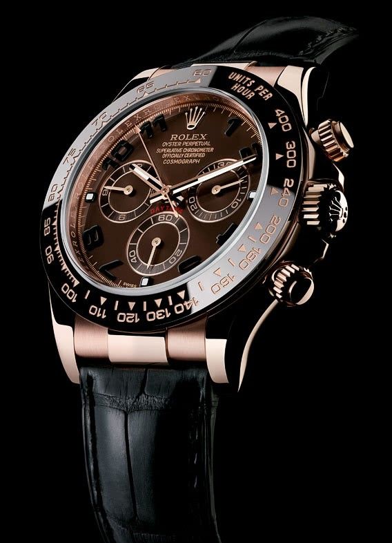 Rolex  Daytona model 116515LN featuring a Rose gold case, a chocolate dial , a black bezel, and a black leather strap.