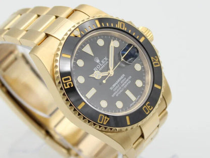 Rolex Submariner yellow gold with a black dial