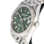 Rolex Datejust featuring an olive green palm motif dial, a stainless steel Jubilee bracelet