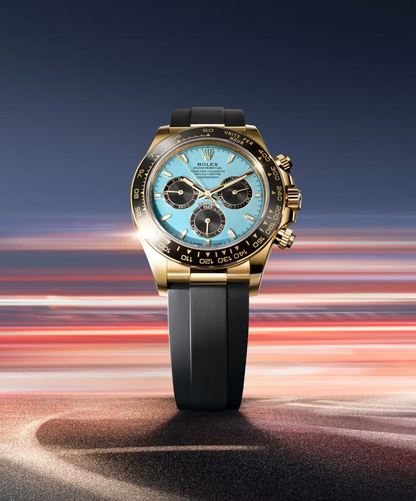 Rolex Daytona model 126518LN-0014, featuring a turquoise blue dial and a black bracelet.