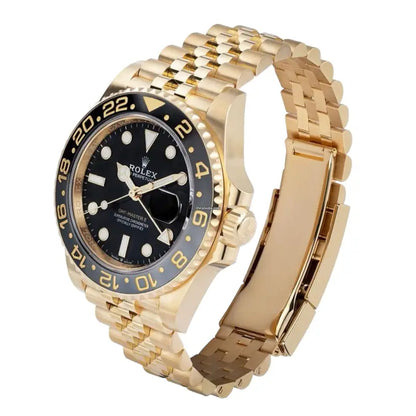 Rolex GMT-Master, likely reference 126718GRNR, featuring an yellow gold case and a Jubilee bracelet.