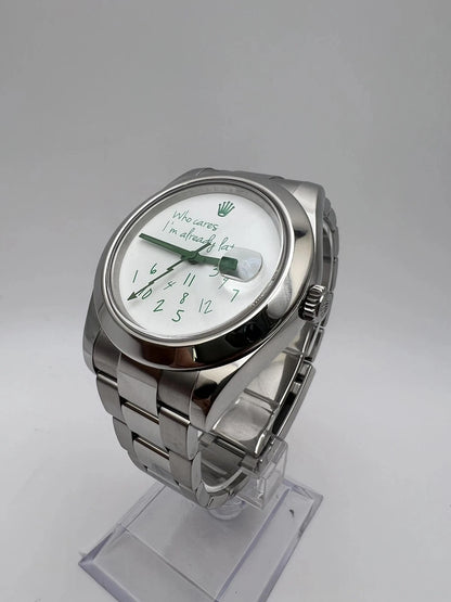 Rolex customized version featuring a white dial with the phrase "Who Cares I'm Already Late" and scattered numerals Milgauss featuring a white dial with the phrase "Who Cares I'm Already Late" and scattered numerals
