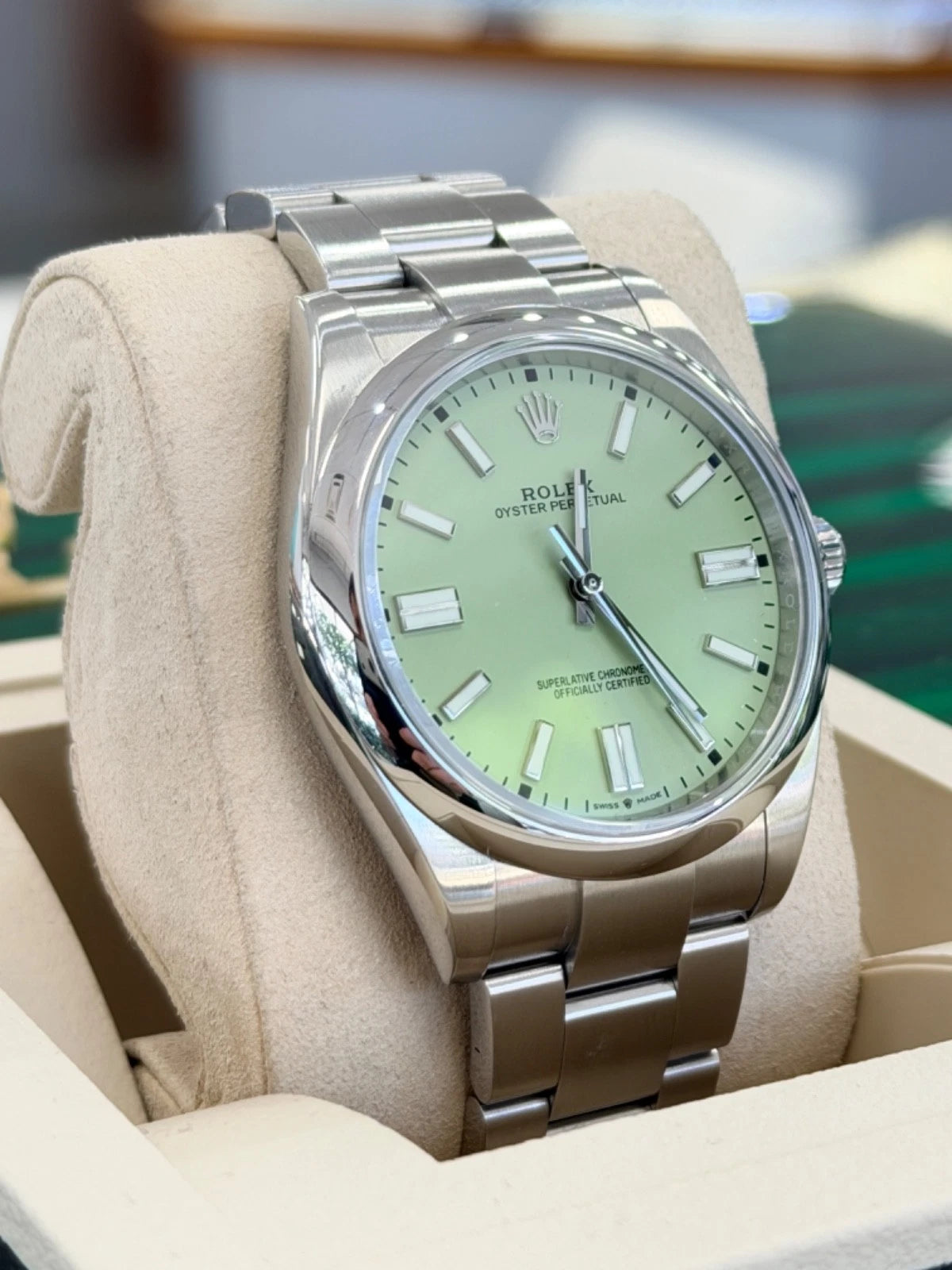 Rolex Oyster Perpetual watch with a pistachio green dial