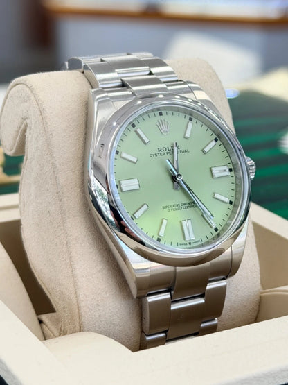 Rolex Oyster Perpetual watch with a pistachio green dial